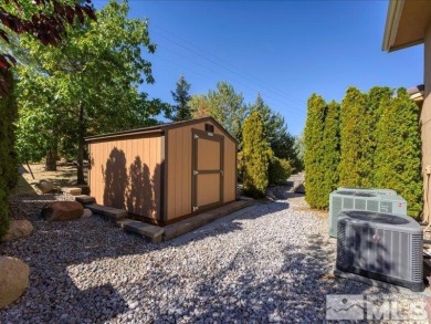 A South Reno Estate That Redefines Luxury Living - With No HOA on Wolf Run Golf Club in Nevada - for sale on GolfHomes.com, golf home, golf lot