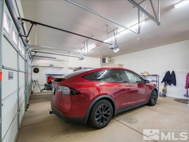A South Reno Estate That Redefines Luxury Living - With No HOA on Wolf Run Golf Club in Nevada - for sale on GolfHomes.com, golf home, golf lot