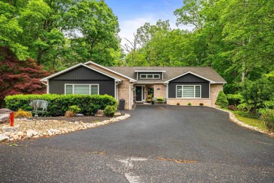 Nestled in the desirable Massanutten community, this stunning on Woodstone Meadows Golf Course At Massanutten in Virginia - for sale on GolfHomes.com, golf home, golf lot
