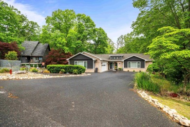 Nestled in the desirable Massanutten community, this stunning on Woodstone Meadows Golf Course At Massanutten in Virginia - for sale on GolfHomes.com, golf home, golf lot