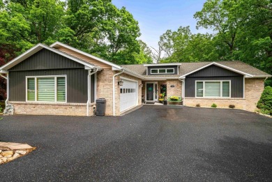 Nestled in the desirable Massanutten community, this stunning on Woodstone Meadows Golf Course At Massanutten in Virginia - for sale on GolfHomes.com, golf home, golf lot
