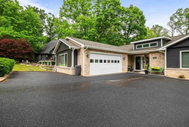 Nestled in the desirable Massanutten community, this stunning on Woodstone Meadows Golf Course At Massanutten in Virginia - for sale on GolfHomes.com, golf home, golf lot