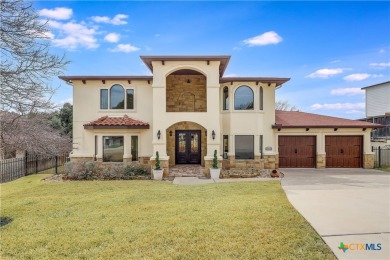 This luxurious Mediterranean-style home boasts of views of Lake on Highland Lakes Golf Course in Texas - for sale on GolfHomes.com, golf home, golf lot