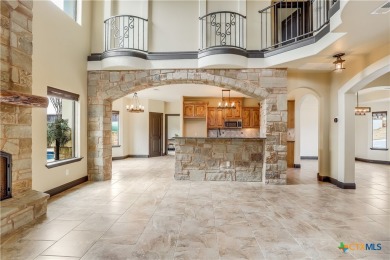 This luxurious Mediterranean-style home boasts of views of Lake on Highland Lakes Golf Course in Texas - for sale on GolfHomes.com, golf home, golf lot