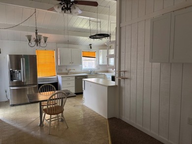 Investment opportunity or a single family home with additional on Captains Cove Golf and Yacht Club in Virginia - for sale on GolfHomes.com, golf home, golf lot