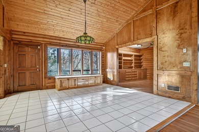 Welcome to an One-of-a-Kind Dovetail Log Home in Buckhorn on White Path Golf Club in Georgia - for sale on GolfHomes.com, golf home, golf lot