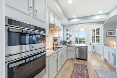 Expansive golf course views from this updated end-unit in on Grand Haven Golf Club in Florida - for sale on GolfHomes.com, golf home, golf lot