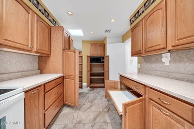 Looking for a 2 bedroom 2 bath home PLUS DEN in Sun City?? on Sun City Lakes West and East in Arizona - for sale on GolfHomes.com, golf home, golf lot