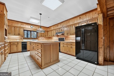 Welcome to an One-of-a-Kind Dovetail Log Home in Buckhorn on White Path Golf Club in Georgia - for sale on GolfHomes.com, golf home, golf lot