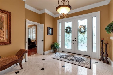 A grand traditional residence, this 3-bedroom, 3.5-bath home is on The Oaks Club in Florida - for sale on GolfHomes.com, golf home, golf lot