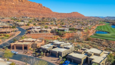 This is definitely a WOW home with STUNNING VIEWS of two on Entrada at Snow Canyon in Utah - for sale on GolfHomes.com, golf home, golf lot