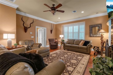 A grand traditional residence, this 3-bedroom, 3.5-bath home is on The Oaks Club in Florida - for sale on GolfHomes.com, golf home, golf lot