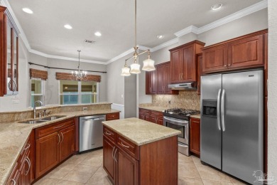 Exceptional Elegance in Prestigious Tiger Point - A Must-See on Tiger Point Golf and Country Club in Florida - for sale on GolfHomes.com, golf home, golf lot