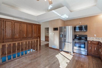 Sprawling lakefront retreat with easy walking access to the on Holiday Island Executive Golf Course in Arkansas - for sale on GolfHomes.com, golf home, golf lot