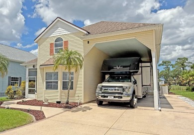 The perfect winter retreat or full-time residence, you have to on The Great Outdoors Golf and Country Club in Florida - for sale on GolfHomes.com, golf home, golf lot
