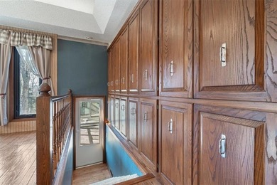 Sprawling lakefront retreat with easy walking access to the on Holiday Island Executive Golf Course in Arkansas - for sale on GolfHomes.com, golf home, golf lot