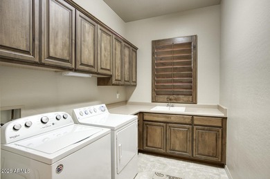 Hacienda-style living at its best! This stunning Legend Trail on Legend Trail Golf Club in Arizona - for sale on GolfHomes.com, golf home, golf lot