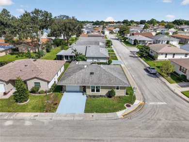 Meticulously maintained and move-in ready! This budget-friendly on Highland Fairways Golf Club in Florida - for sale on GolfHomes.com, golf home, golf lot