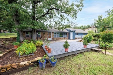 Tucked at the end of a quiet looped road, this 3-bedroom, 1 on Independence Country Club in Kansas - for sale on GolfHomes.com, golf home, golf lot