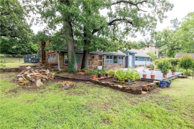 Tucked at the end of a quiet looped road, this 3-bedroom, 1 on Independence Country Club in Kansas - for sale on GolfHomes.com, golf home, golf lot