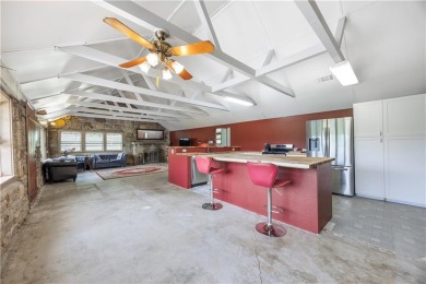 Tucked at the end of a quiet looped road, this 3-bedroom, 1 on Independence Country Club in Kansas - for sale on GolfHomes.com, golf home, golf lot