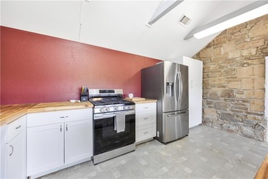 Tucked at the end of a quiet looped road, this 3-bedroom, 1 on Independence Country Club in Kansas - for sale on GolfHomes.com, golf home, golf lot