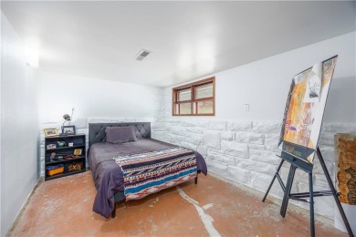 Tucked at the end of a quiet looped road, this 3-bedroom, 1 on Independence Country Club in Kansas - for sale on GolfHomes.com, golf home, golf lot