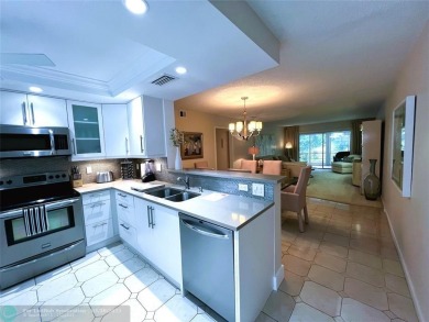 REDUCED to Assist with Improvements. SPECTACULAR EXPANSIVE on Wynmoor Golf Course in Florida - for sale on GolfHomes.com, golf home, golf lot