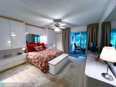 REDUCED to Assist with Improvements. SPECTACULAR EXPANSIVE on Wynmoor Golf Course in Florida - for sale on GolfHomes.com, golf home, golf lot