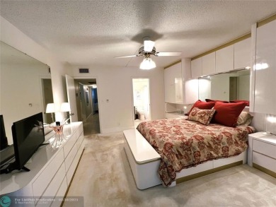 REDUCED to Assist with Improvements. SPECTACULAR EXPANSIVE on Wynmoor Golf Course in Florida - for sale on GolfHomes.com, golf home, golf lot