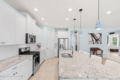 Discover refined Florida living in this exceptional luxury home on Duran Golf Course in Florida - for sale on GolfHomes.com, golf home, golf lot