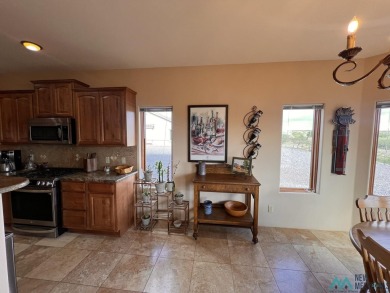 THIS BEAUTIFUL TUSCAN HOME INCLUDING THE VACANT LOT NEXT DOOR TO on Sierra Del Rio Golf Club in New Mexico - for sale on GolfHomes.com, golf home, golf lot