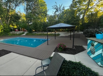 Stunning mid-century contemporary tri-level with inground pool on Forest Hills Country Club in Illinois - for sale on GolfHomes.com, golf home, golf lot