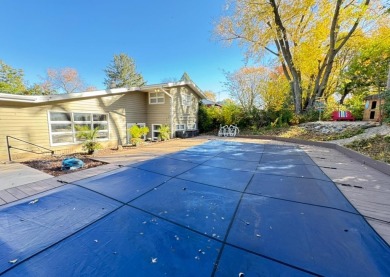 Stunning mid-century contemporary tri-level with inground pool on Forest Hills Country Club in Illinois - for sale on GolfHomes.com, golf home, golf lot