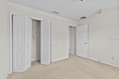 One or more photo(s) has been virtually staged. This is on Oaks National Golf Course in Florida - for sale on GolfHomes.com, golf home, golf lot