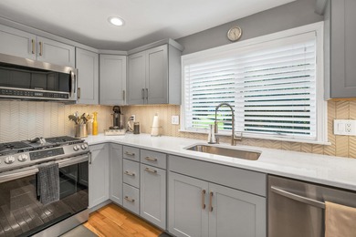 Welcome to this stunning end-unit townhome in the highly on Sky Meadow Country Club in New Hampshire - for sale on GolfHomes.com, golf home, golf lot