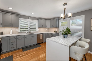 Welcome to this stunning end-unit townhome in the highly on Sky Meadow Country Club in New Hampshire - for sale on GolfHomes.com, golf home, golf lot