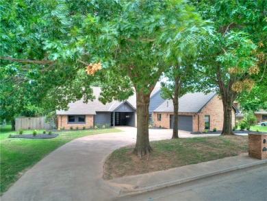 This thoughtfully updated home is nestled onto a large lot in on Oak Tree National Golf and Country Club in Oklahoma - for sale on GolfHomes.com, golf home, golf lot
