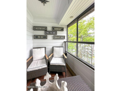 5A6 has been completely remodeled with board & batten walls on Sagamore Resort and Golf Club in New York - for sale on GolfHomes.com, golf home, golf lot