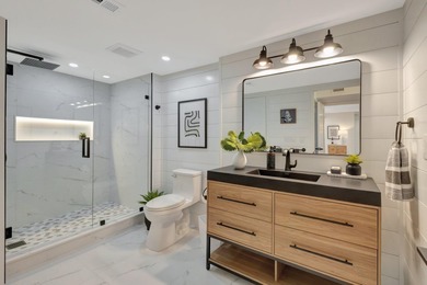 This exceptional residence has been completely reimagined with a on Hunters Run Golf and Country Club in Florida - for sale on GolfHomes.com, golf home, golf lot