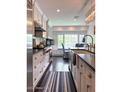 5A6 has been completely remodeled with board & batten walls on Sagamore Resort and Golf Club in New York - for sale on GolfHomes.com, golf home, golf lot