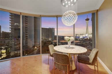 Stunning corner residence with dramatic curved floor-to-ceiling on  in Nevada - for sale on GolfHomes.com, golf home, golf lot