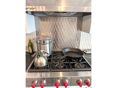 5A6 has been completely remodeled with board & batten walls on Sagamore Resort and Golf Club in New York - for sale on GolfHomes.com, golf home, golf lot