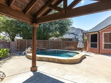 THIS 3,145 SQ FT HOME, NESTLED IN THE GATED NEIGHBORHOOD OF on Trophy Club of Dallas in Texas - for sale on GolfHomes.com, golf home, golf lot