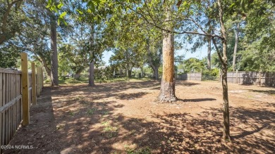 Nestled among some of the most majestic live oaks in Southport on The Lakes Country Club in North Carolina - for sale on GolfHomes.com, golf home, golf lot