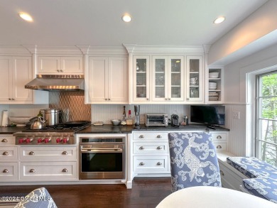 5A6 has been completely remodeled with board & batten walls on Sagamore Resort and Golf Club in New York - for sale on GolfHomes.com, golf home, golf lot