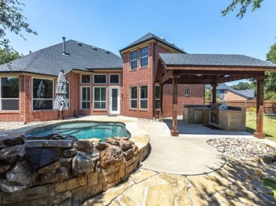 THIS 3,145 SQ FT HOME, NESTLED IN THE GATED NEIGHBORHOOD OF on Trophy Club of Dallas in Texas - for sale on GolfHomes.com, golf home, golf lot