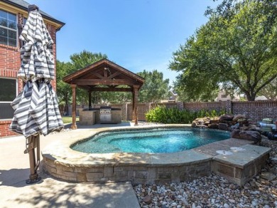 THIS 3,145 SQ FT HOME, NESTLED IN THE GATED NEIGHBORHOOD OF on Trophy Club of Dallas in Texas - for sale on GolfHomes.com, golf home, golf lot