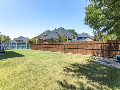 THIS 3,145 SQ FT HOME, NESTLED IN THE GATED NEIGHBORHOOD OF on Trophy Club of Dallas in Texas - for sale on GolfHomes.com, golf home, golf lot