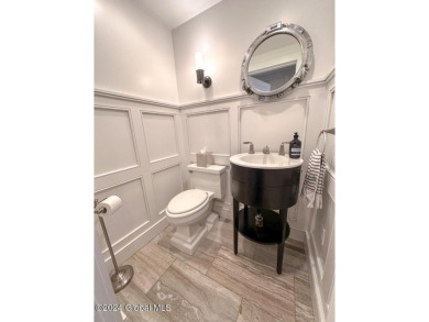 5A6 has been completely remodeled with board & batten walls on Sagamore Resort and Golf Club in New York - for sale on GolfHomes.com, golf home, golf lot